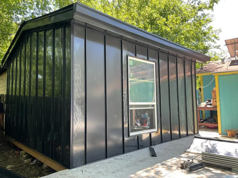 Black standing seam metal wall panels for Metal Roof Installation in Cave Spring