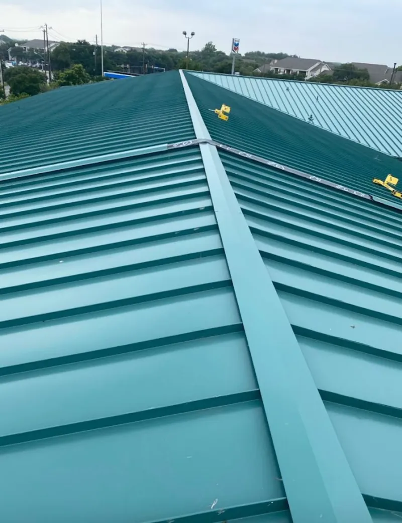 Green commercial metal roof ridge and valley for Metal Roof Repair in Cave Spring